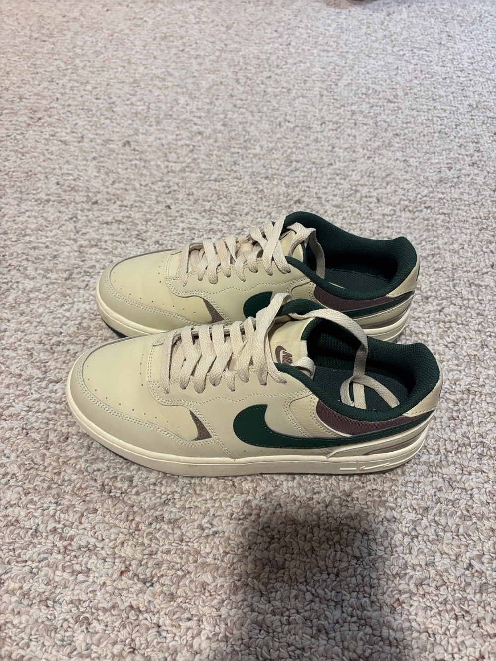 Nike Women's Cream Sneakers with Dark Green Swoosh